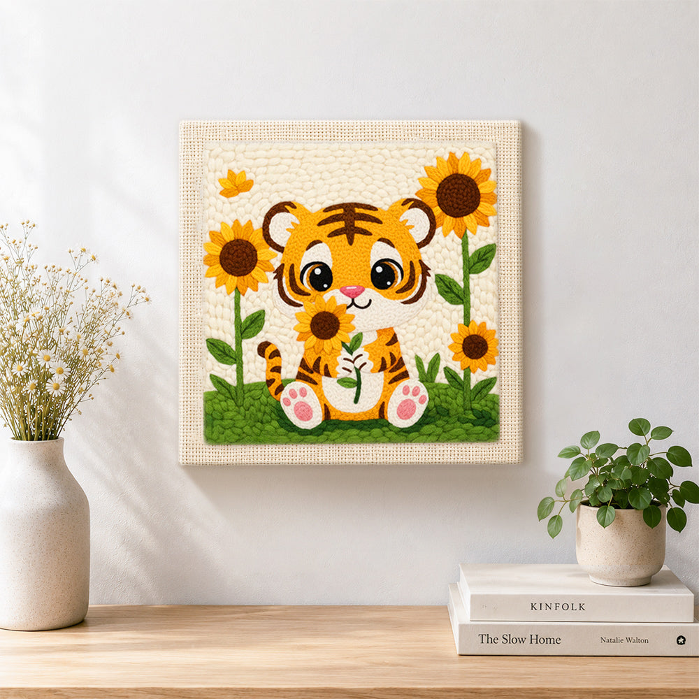 Finished smiling baby tiger with sunflowers artwork displayed on a wall