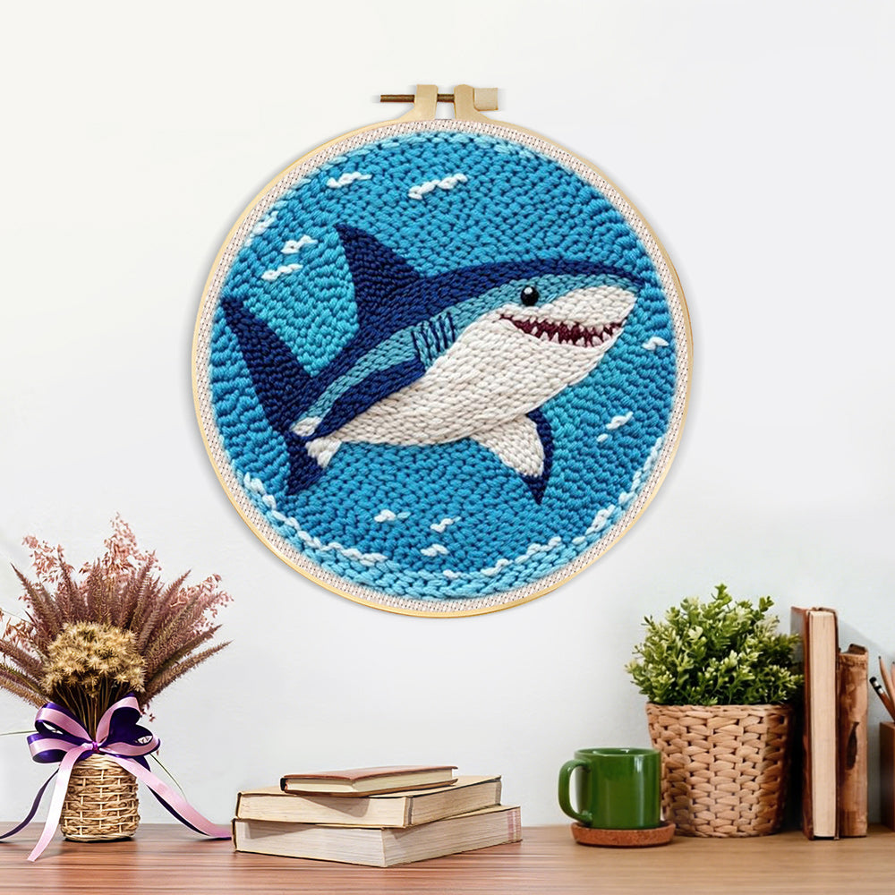 Finished smiling deep-sea shark artwork displayed on a wall