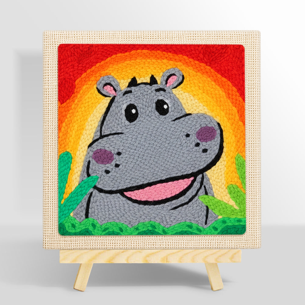 Smiling grey hippo with rainbow sunset punch needle kit for beginners