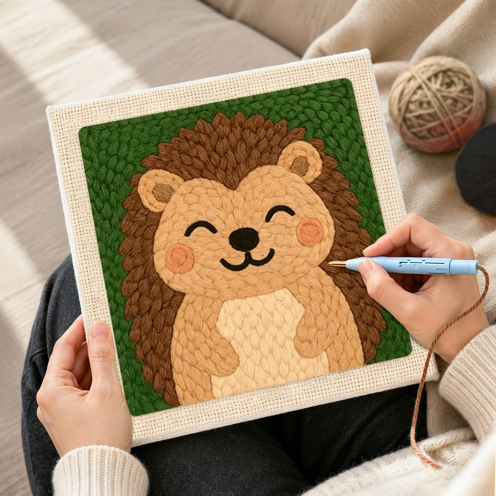 Creating handmade smiling hedgehog punch needle artwork