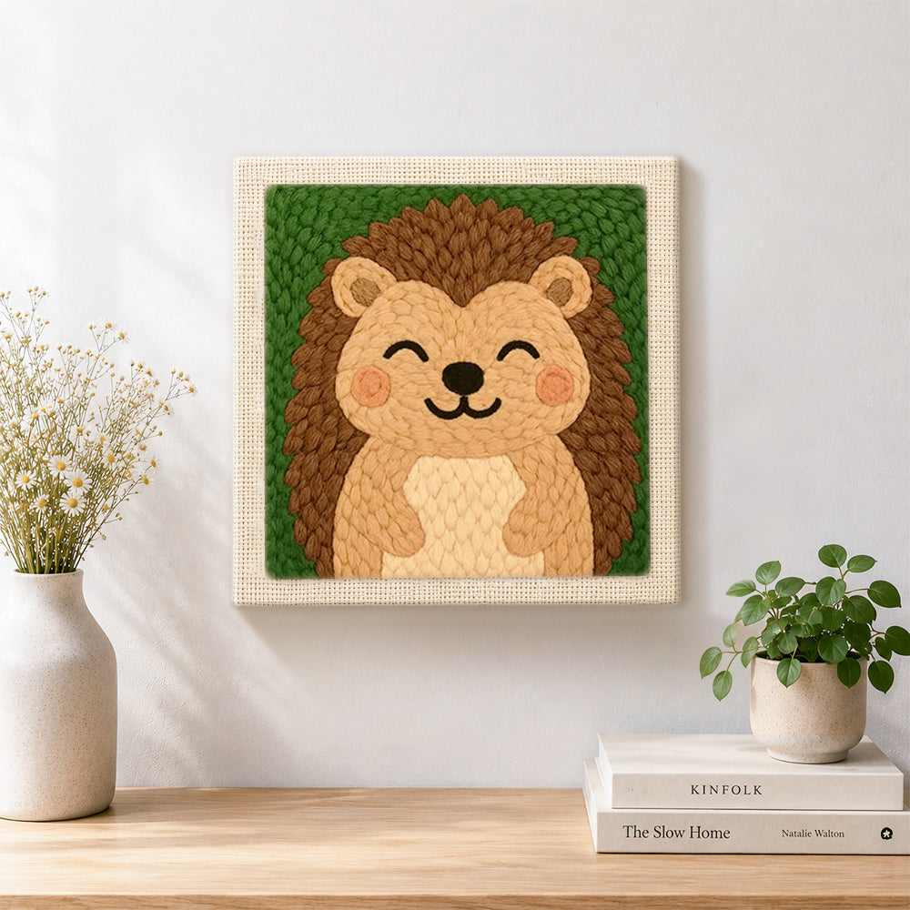 Finished smiling hedgehog artwork displayed on a wall