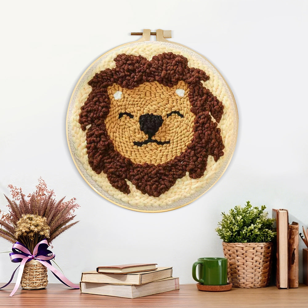Finished smiling lion artwork displayed on a wall