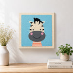 Finished smiling zebra head artwork displayed on a wall