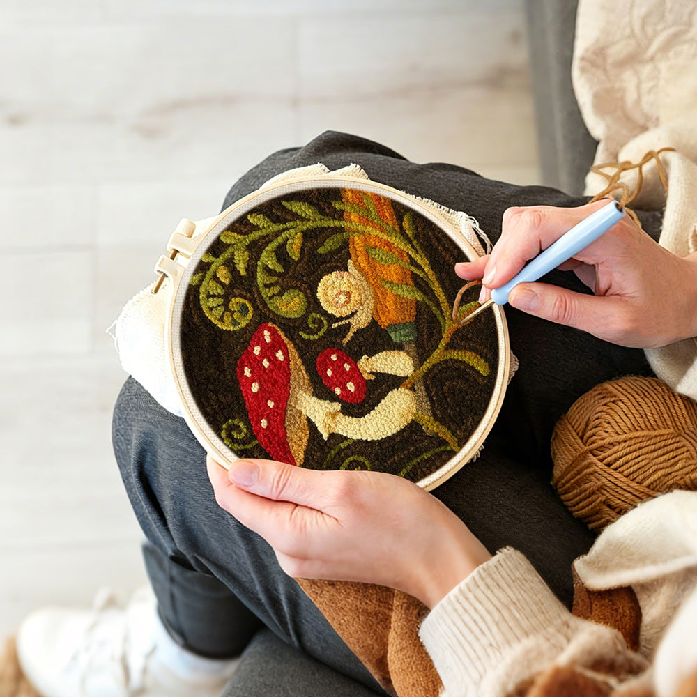 Creating handmade snail and mushroom punch needle artwork