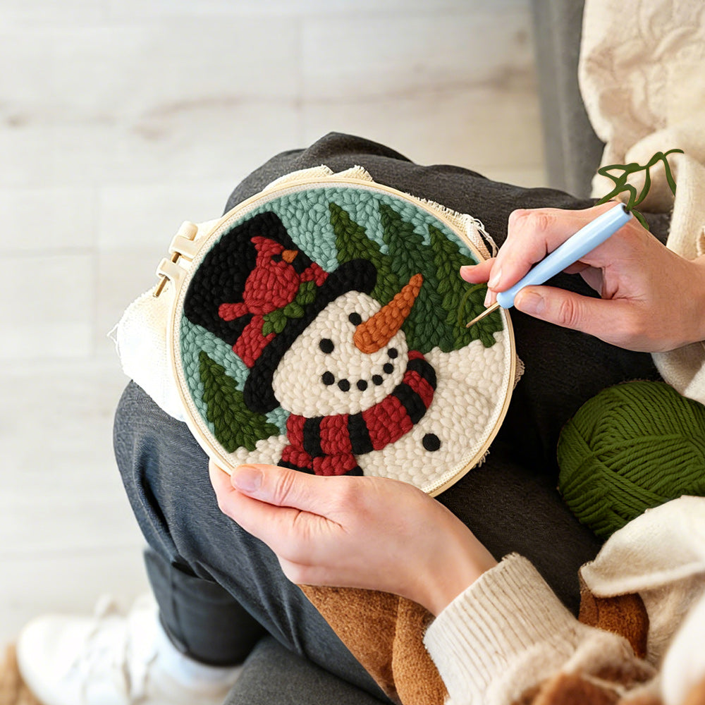 Creating handmade snowman with red cardinal bird punch needle artwork