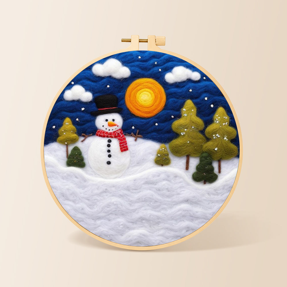 Snowman with red scarf and pine trees needle felting kit for beginners with a round wooden frame