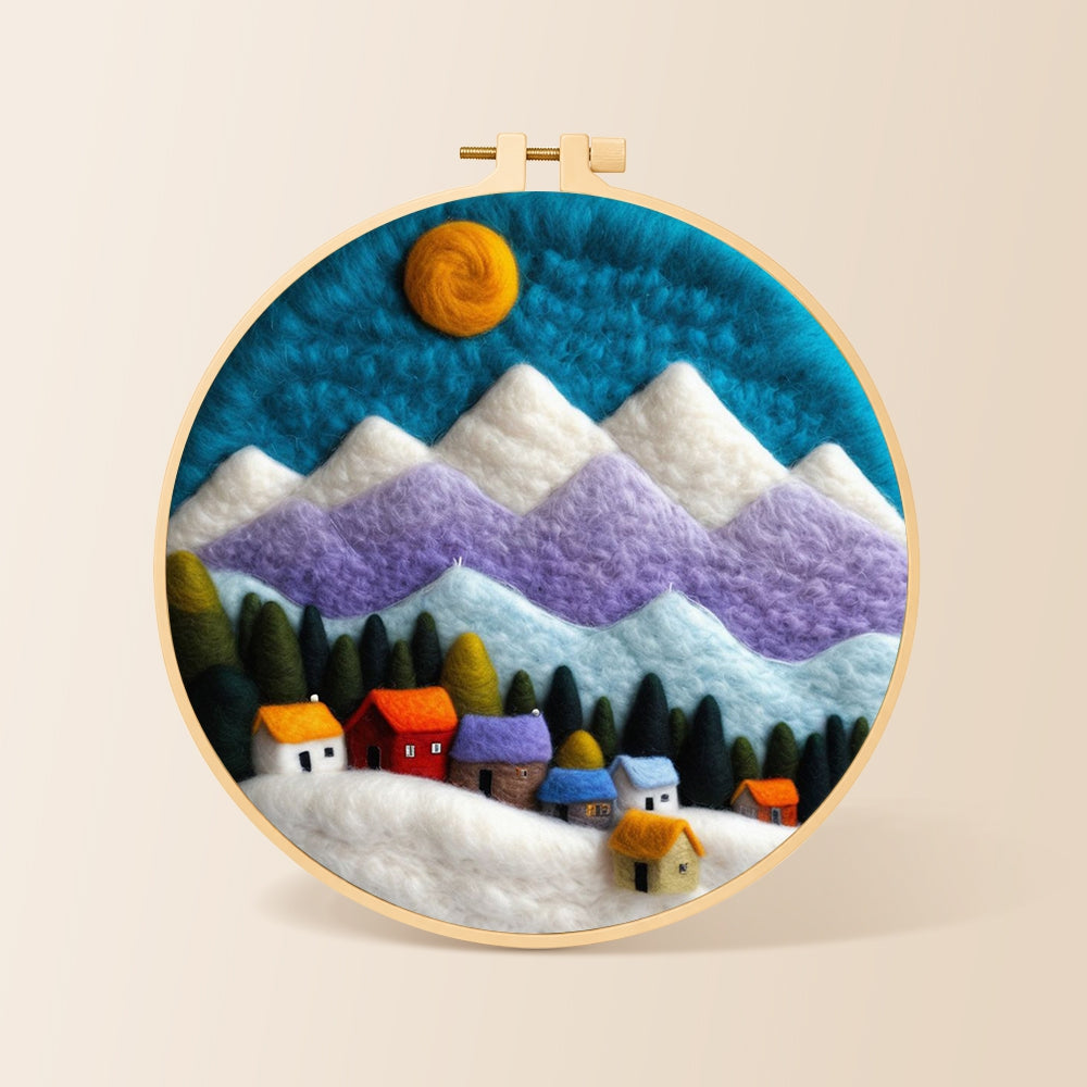 Snowy village under the mountains needle felting kit for beginners with a round wooden frame