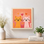 Finished snuggling orange and pink cat couple artwork displayed on a wall