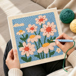 Creating handmade soft daisies punch needle artwork