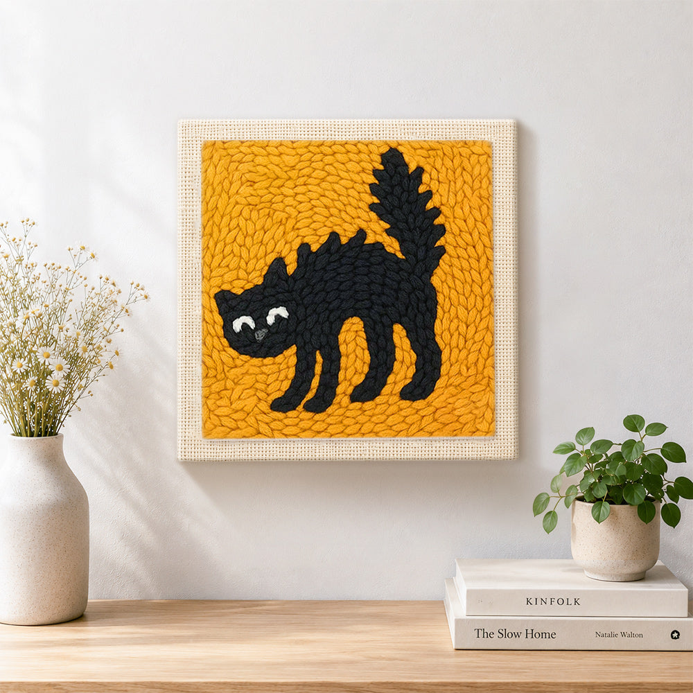 Finished spoof scaredy cat artwork displayed on a wall