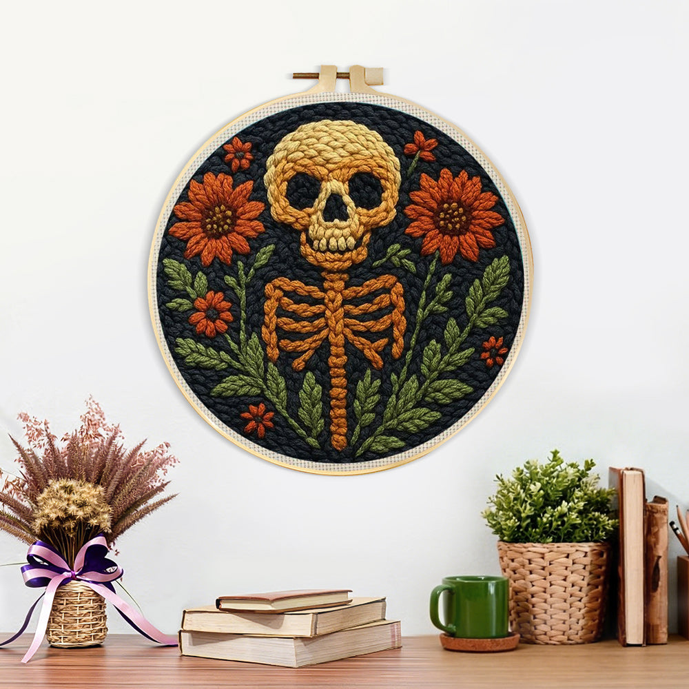 Finished spooky floral skeleton artwork displayed on a wall