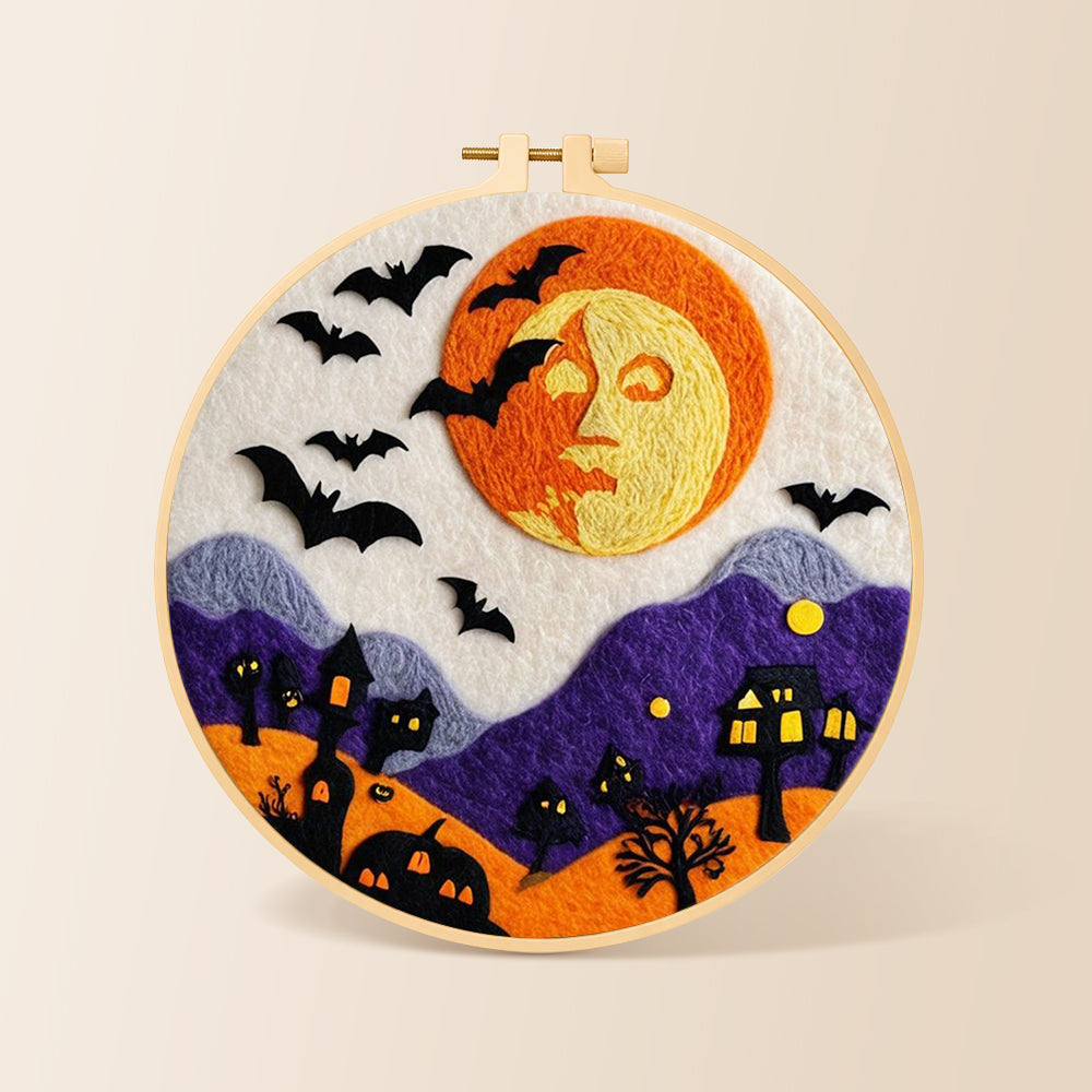 Spooky orange face moon and bats needle felting kit for beginners with a round wooden frame