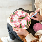 Creating handmade spring blossom punch needle artwork
