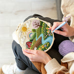 Creating handmade spring countryside farm and rainbow punch needle artwork