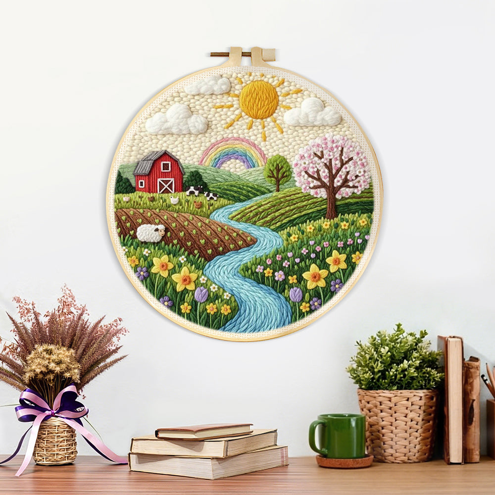 Finished spring countryside farm and rainbow artwork displayed on a wall