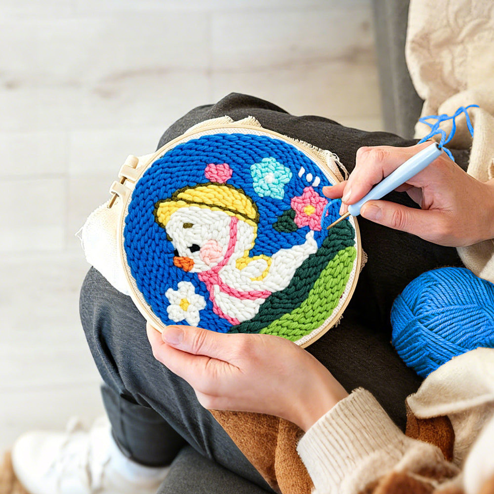 Creating handmade spring duckling punch needle artwork