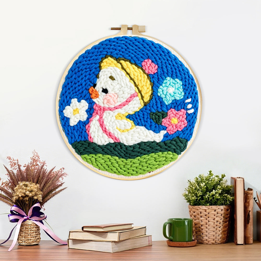 Finished spring duckling artwork displayed on a wall