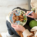 Creating handmade spring highland cow punch needle artwork