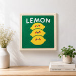 Finished stack of three cute lemons artwork displayed on a wall
