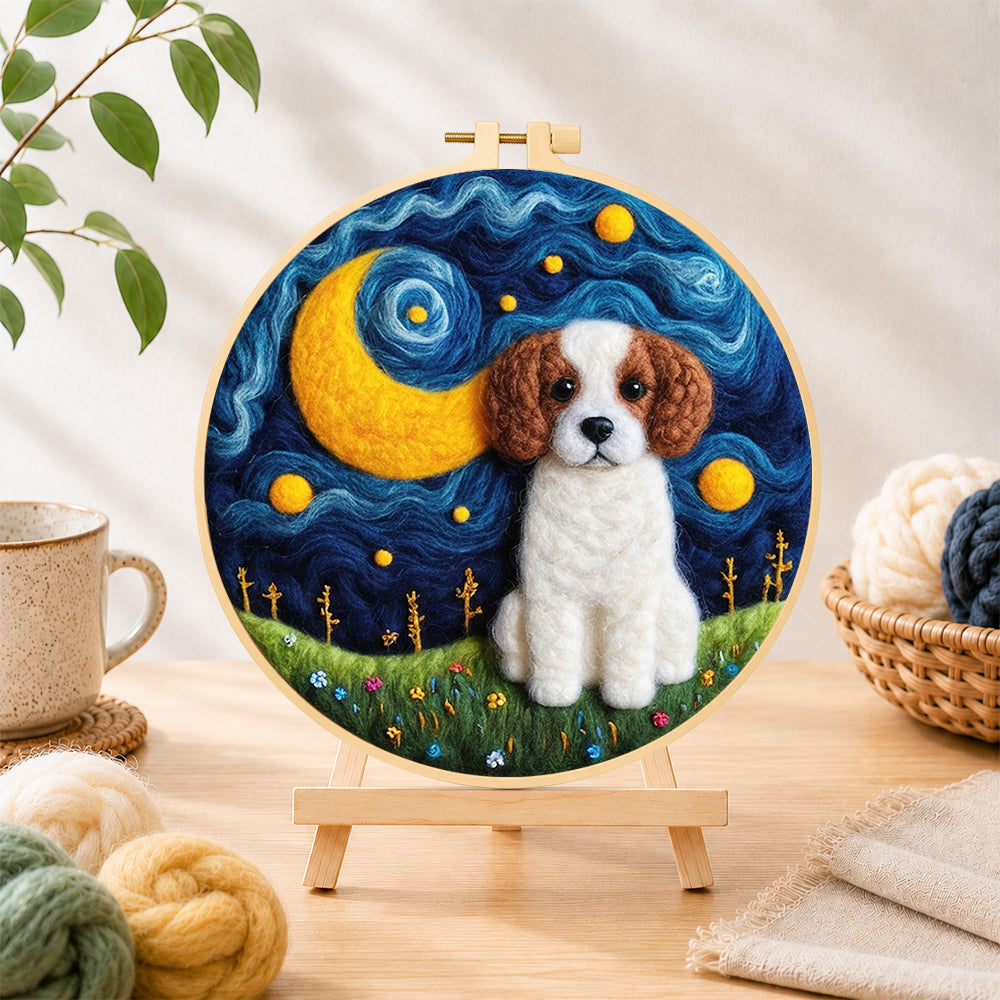 Finished starry night puppy needle felting displayed on a wooden easel
