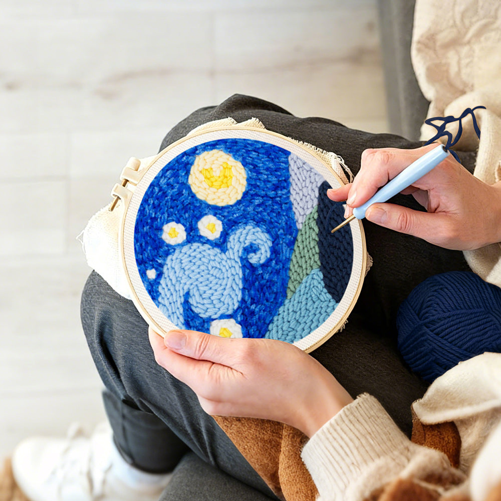 Creating handmade starry night sky with moon and mountains punch needle artwork