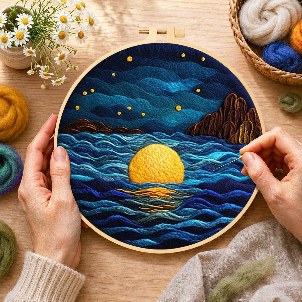 Creating the starry ocean and golden full moon wool painting by hand with a felting needle
