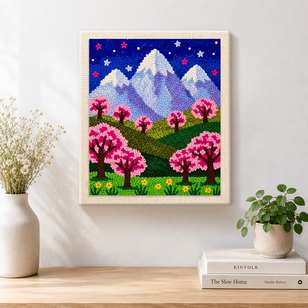 Finished starry sakura mountain at night artwork displayed on a wall