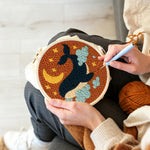 Creating handmade starry whale punch needle artwork