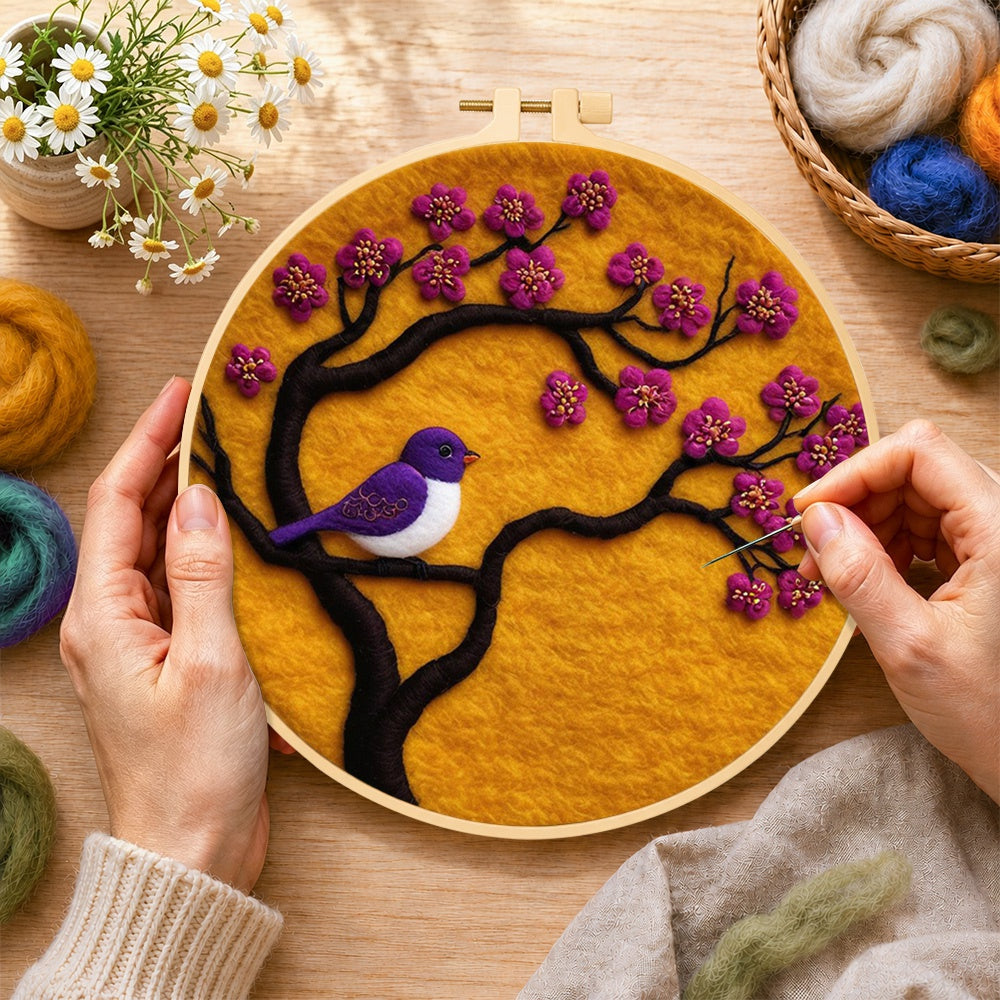 Creating the striking purple bird on blooming branch wool painting by hand with a felting needle