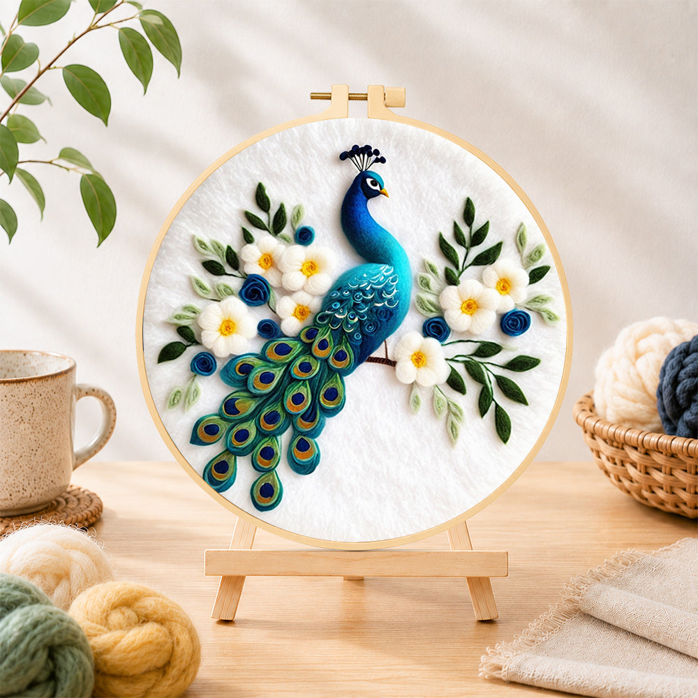 Finished stunning peacock with white flowers needle felting displayed on a wooden easel