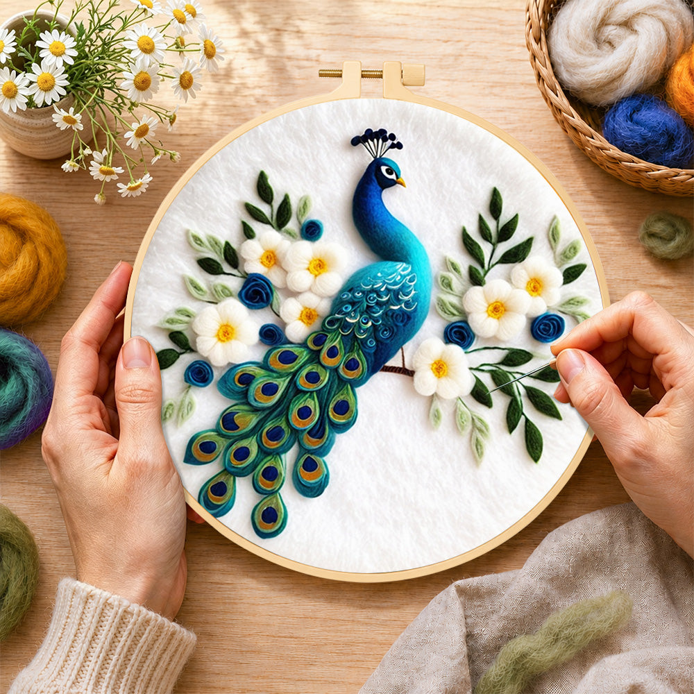 Creating the stunning peacock with white flowers wool painting by hand with a felting needle