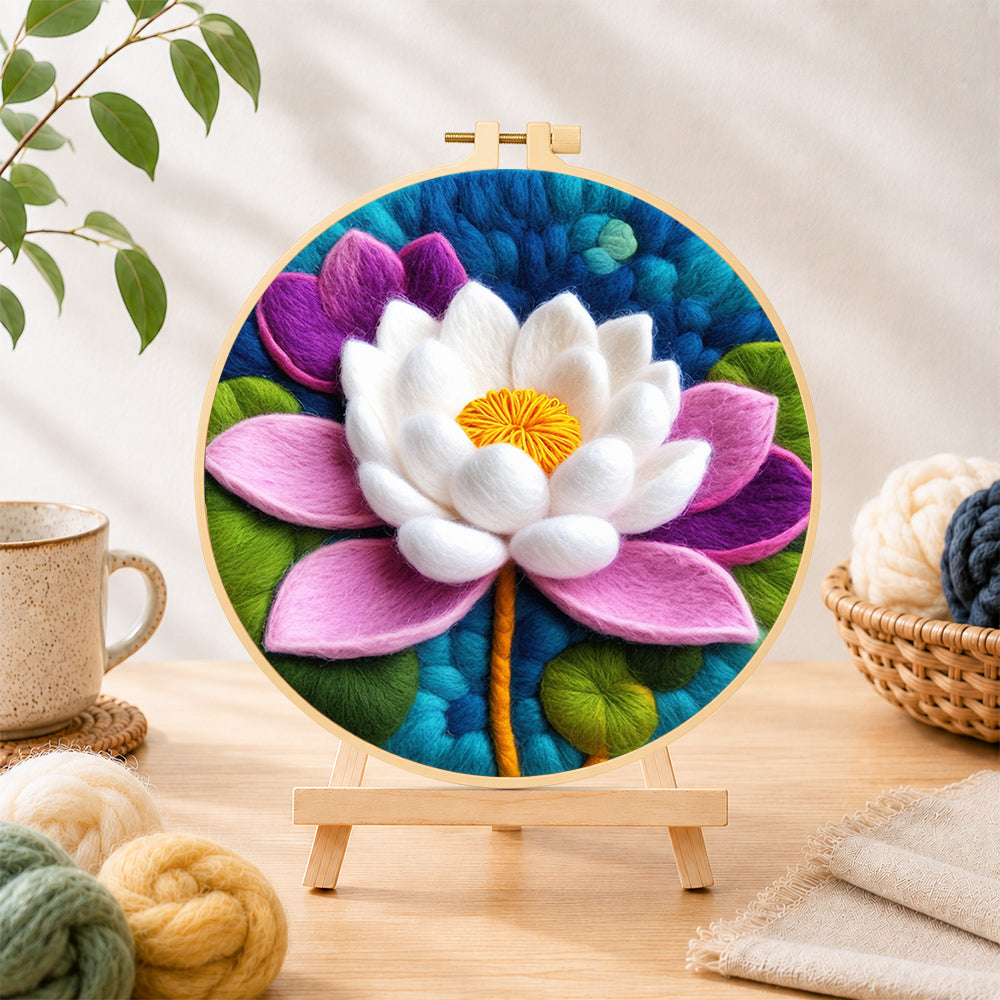 Finished stunning pink and white lotus needle felting displayed on a wooden easel