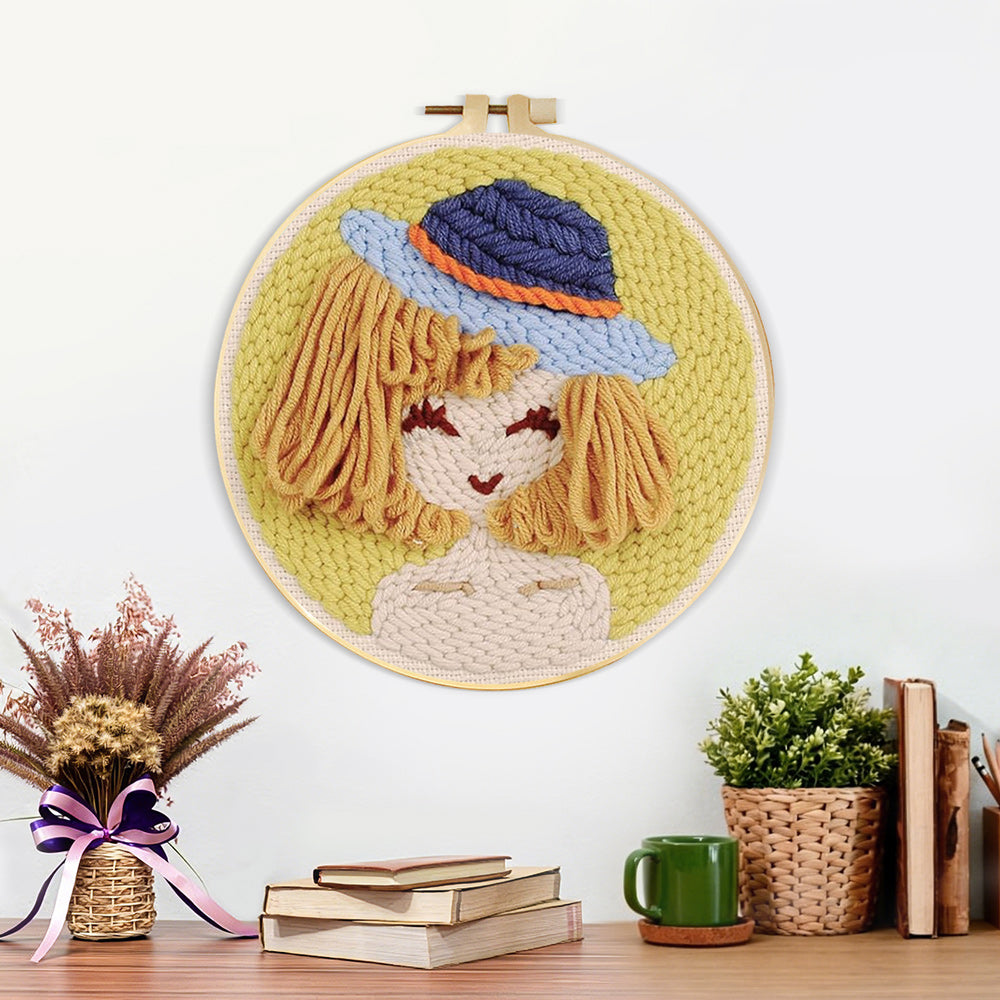 Finished stylised girl in blue bucket hat artwork displayed on a wall