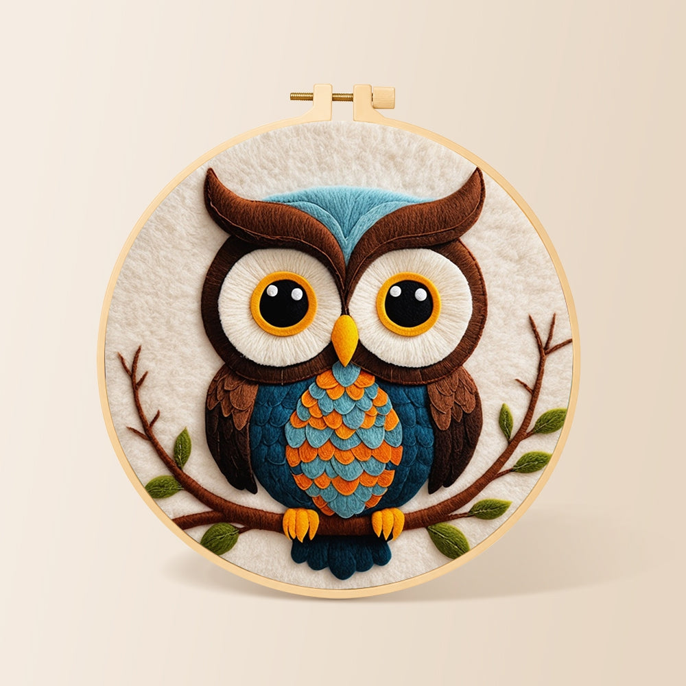 Stylish blue and orange owl needle felting kit for beginners with a round wooden frame