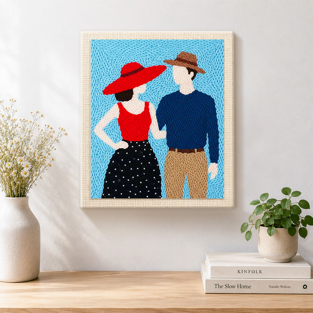 Finished stylish couple in hats artwork displayed on a wall