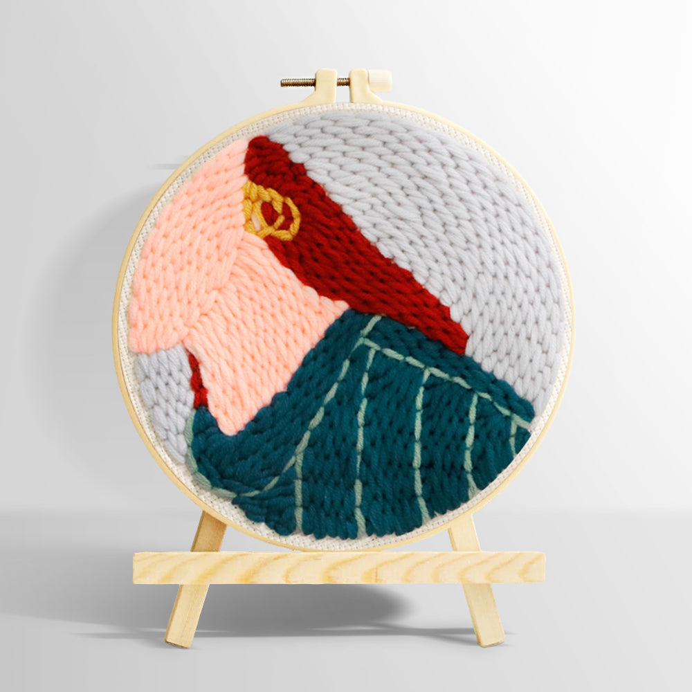 Stylish red-haired lady punch needle kit for beginners