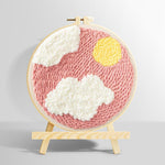 Sun and clouds in pink sky punch needle kit for beginners