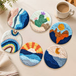Sun, mountains and cactus punch needle coasters used for home decoration