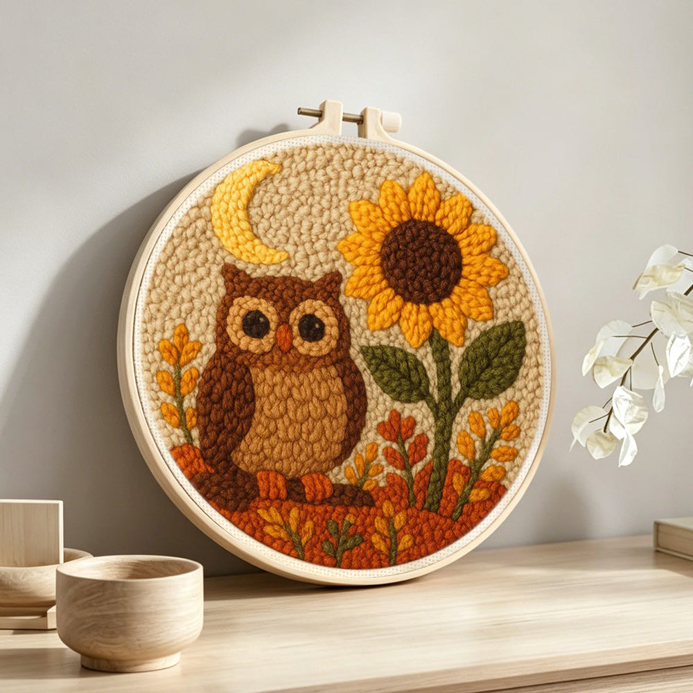 Sunflower owl punch needle artwork displayed on a table