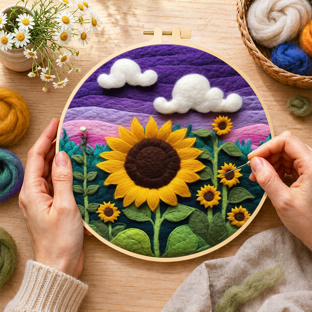Creating the sunflowers under purple sky wool painting by hand with a felting needle