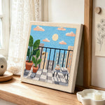 Sunny balcony and potted plants punch needle artwork displayed on a table