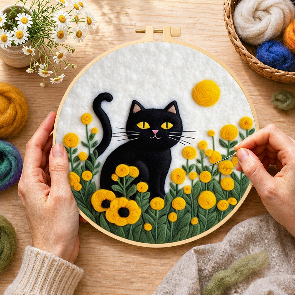 Creating the sunny black cat in yellow flowers wool painting by hand with a felting needle