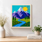 Finished sunny mountain and blue meandering stream artwork displayed on a wall