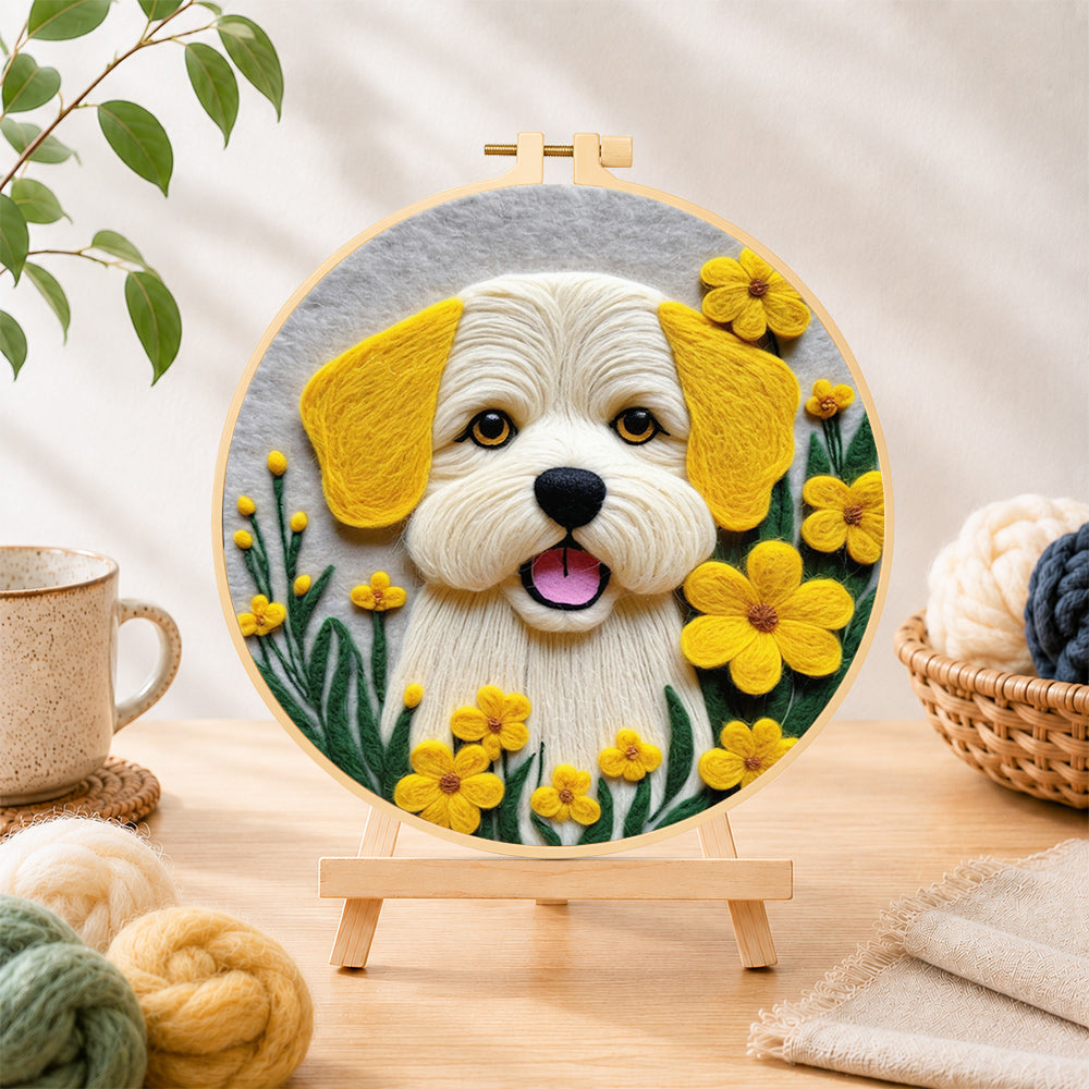 Finished sunny yellow floral puppy needle felting displayed on a wooden easel