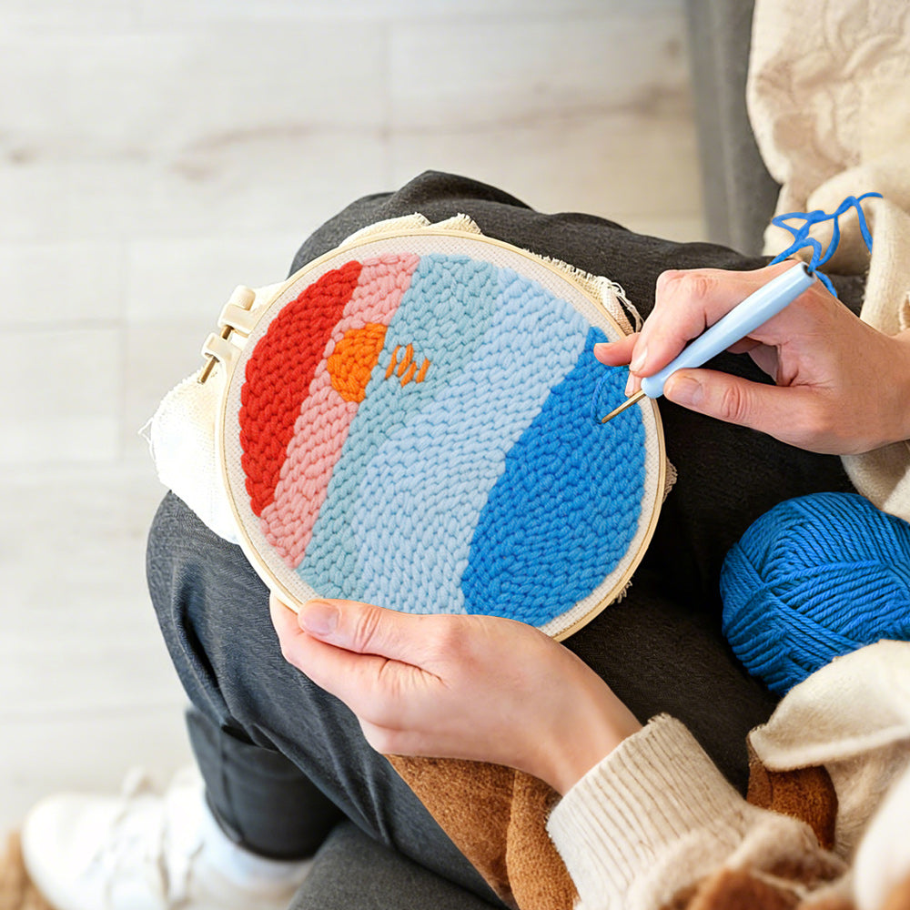 Creating handmade sunrise over ocean punch needle artwork