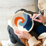 Creating handmade sunrise waves punch needle artwork
