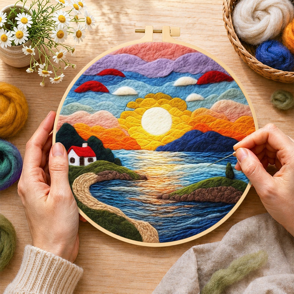 Creating the sunset and seaside cottage wool painting by hand with a felting needle