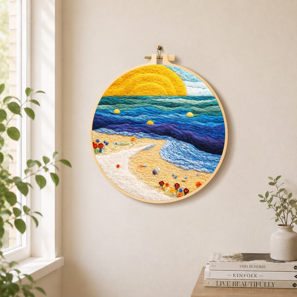 Sunset beach and blue rolling waves needle felt wall art displayed in a bright home interior