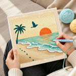 Creating handmade sunset, palm tree and footprints punch needle artwork