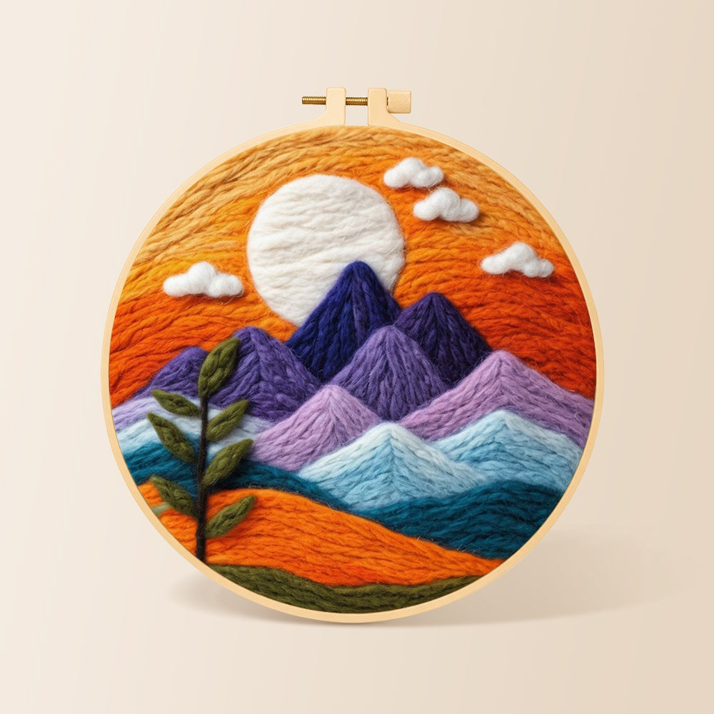 Sunset purple mountains and green sprig needle felting kit for beginners with a round wooden frame